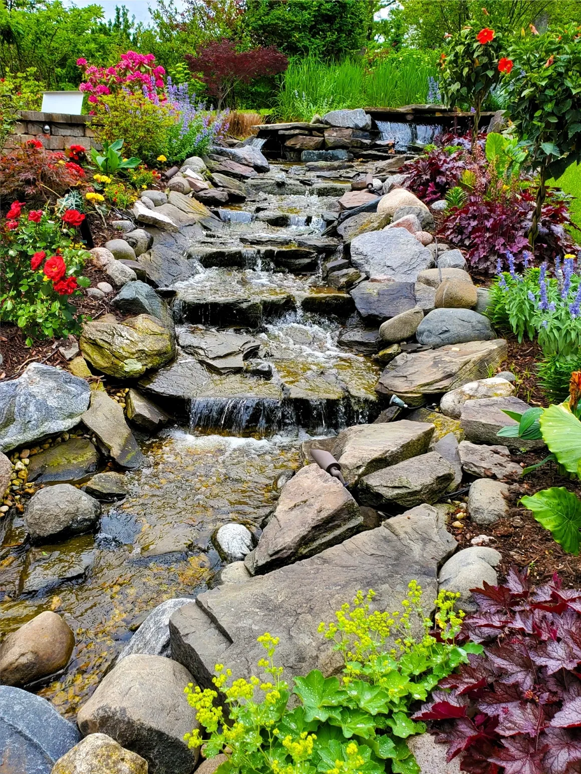 Natural stone waterfall garden water feature