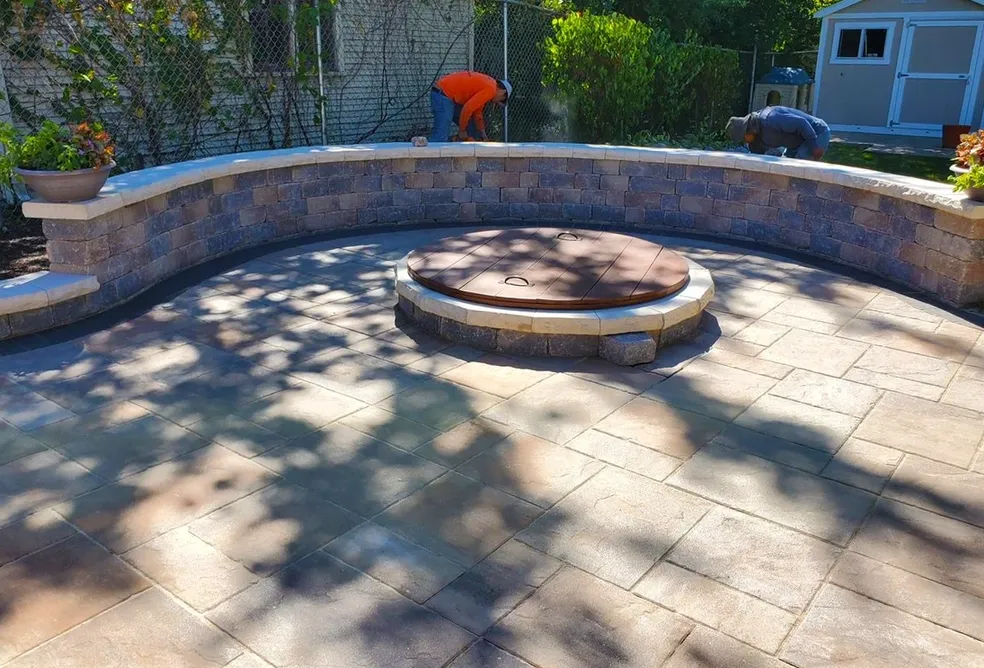 Completed patio paver and firepit seating wall